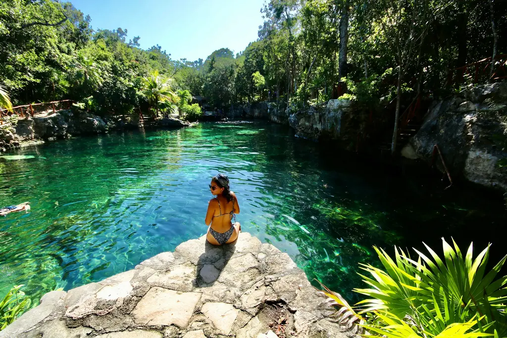 Open turquoise cenote in Tulum