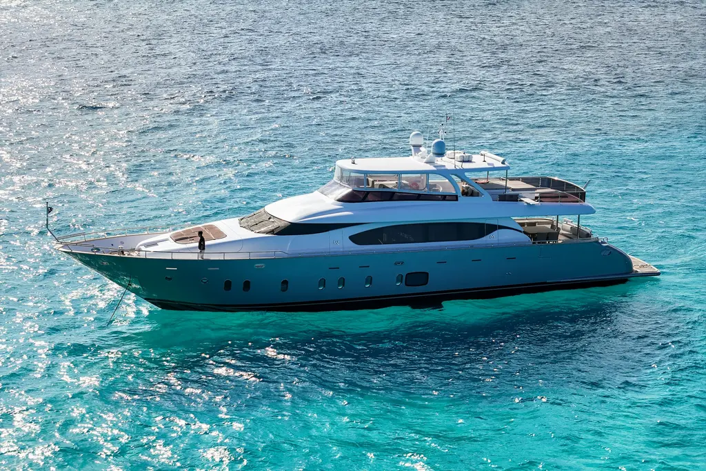 Yacht cruising the turquoise sea in Cancún
